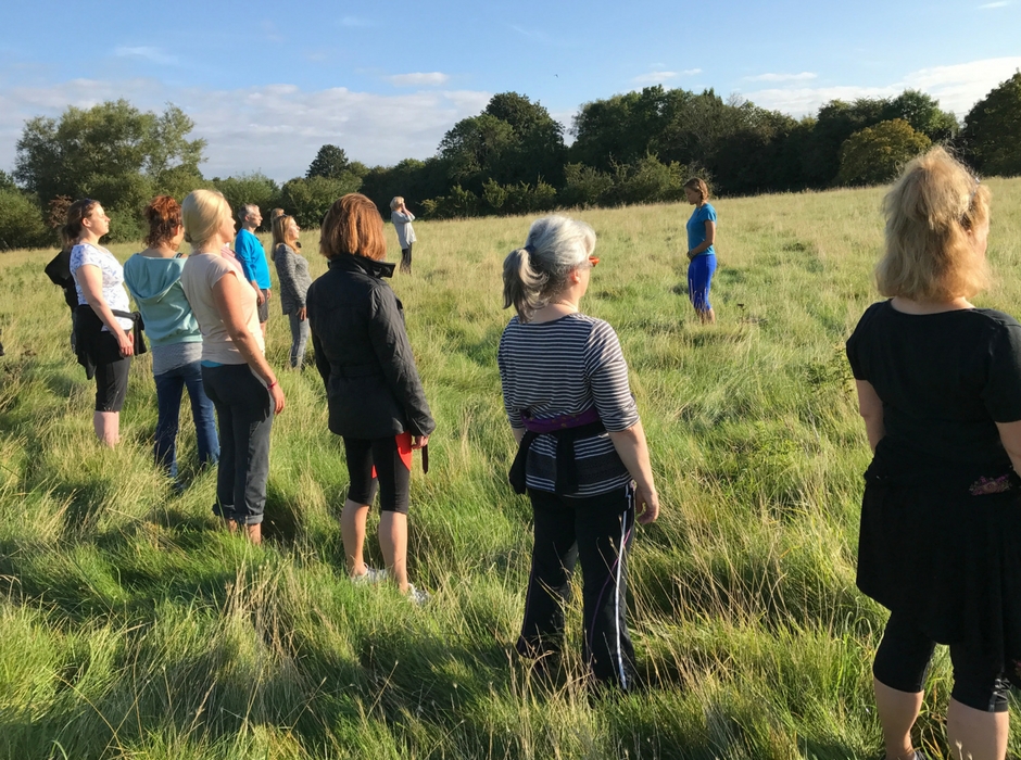 meditating in field group