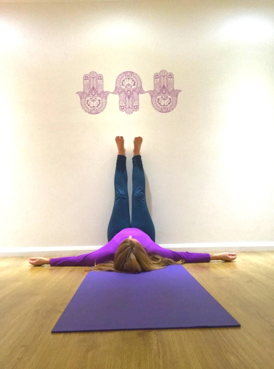 legs up the wall yin yoga pose ease back pain