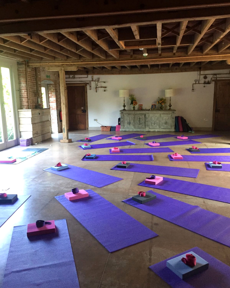 yoga mats with blocks and straps in yoga room - easter yoga retreat norfolk