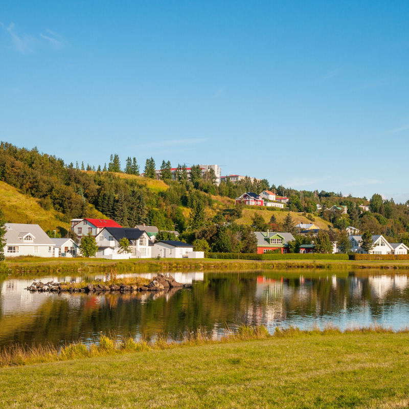 view of Akureyri town and lake adventure yoga holiday iceland
