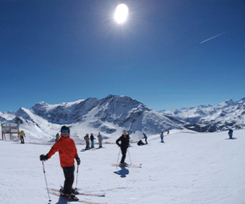 skiers mountain sun ski yoga holiday french alps