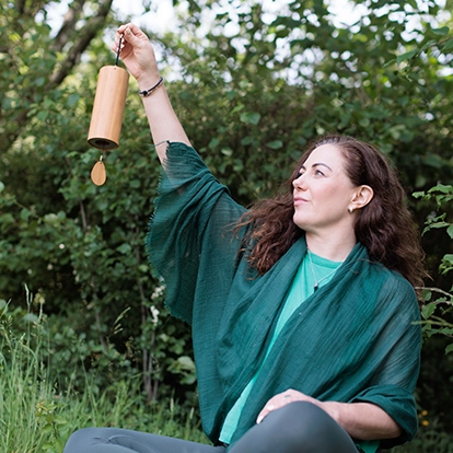 melanie may yoga teacher with gong