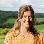 yoga teacher smiling to camera