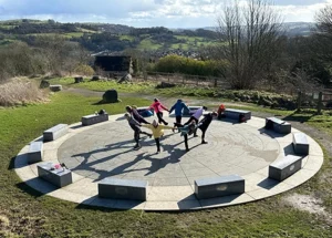 people doing a yoga pose in circle in peak district